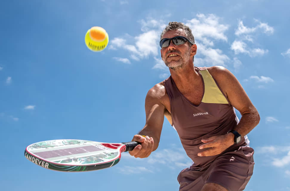 Enjoy Your Time By Playing Beach Tennis